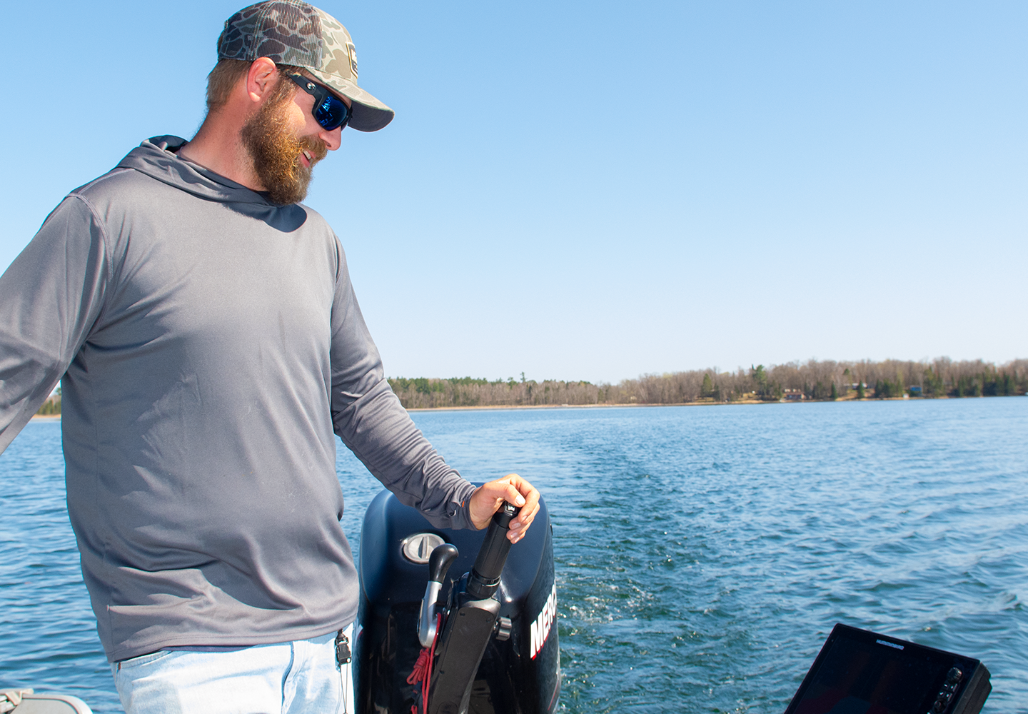 Image of Joe Billiar scanning the weedline in search of panfish