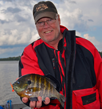 image of rand olson with giant bluegill