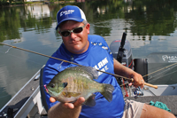 Chad Peterson with giant Bluegill