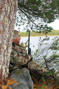 image of Jeremy Taschuk in duck blind on Rainy Lake