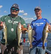 image of andy walsh and ryan berzins with 4 walleyes