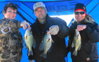 image of ice fishing party with big crappies