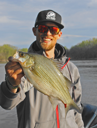 image of Justin Bailey with big White Bass