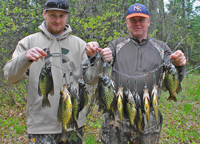 image of joel and jesse clusiau with stringer of crappies